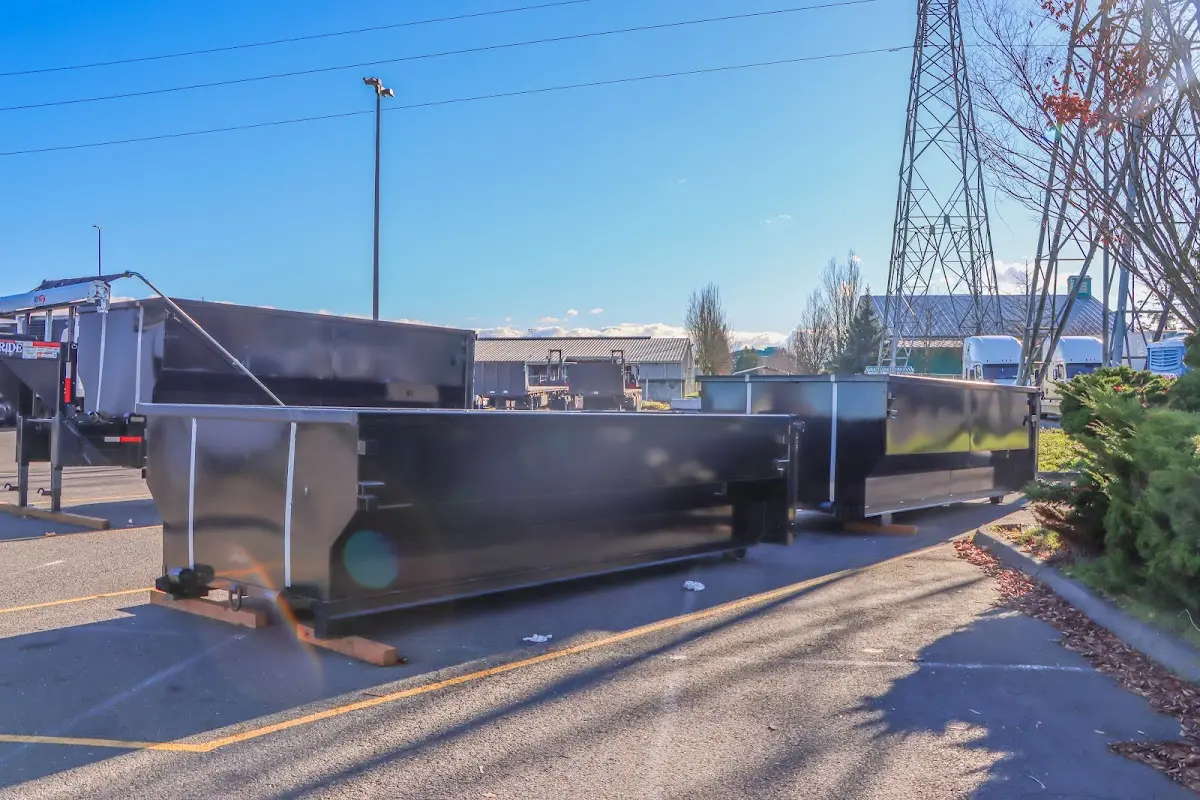 Roll-off dumpster ready for waste disposal at job site for Demolition Dumpster Rental in Kingston